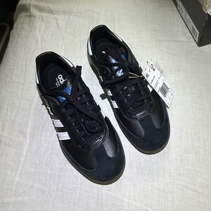 Black Adidas Samba sneakers